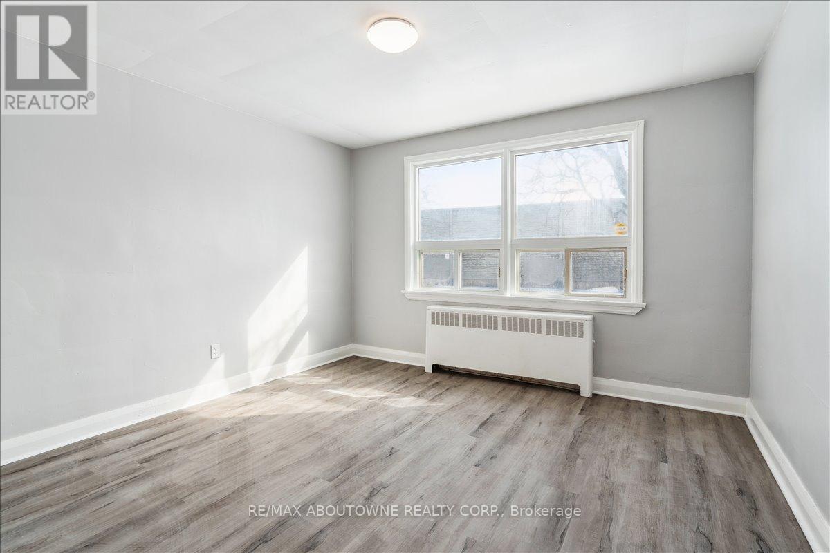 1 - 145 North Service Road E, Oakville, Ontario  L6H 1A3 - Photo 20 - W12445315