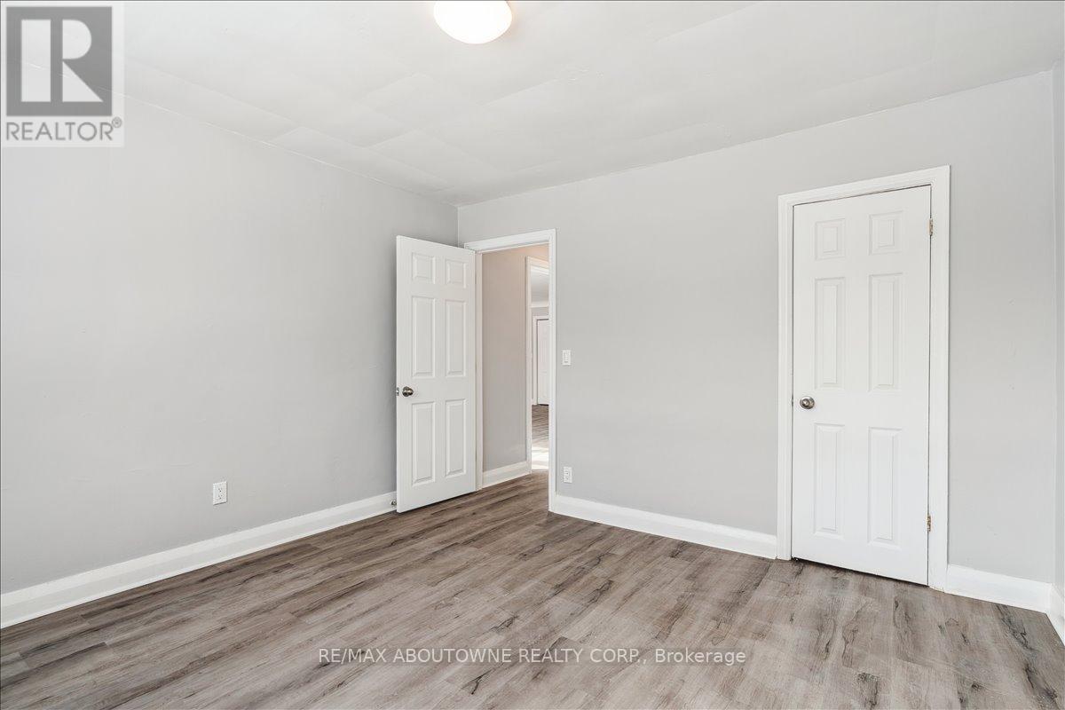 1 - 145 North Service Road E, Oakville, Ontario  L6H 1A3 - Photo 21 - W12445315