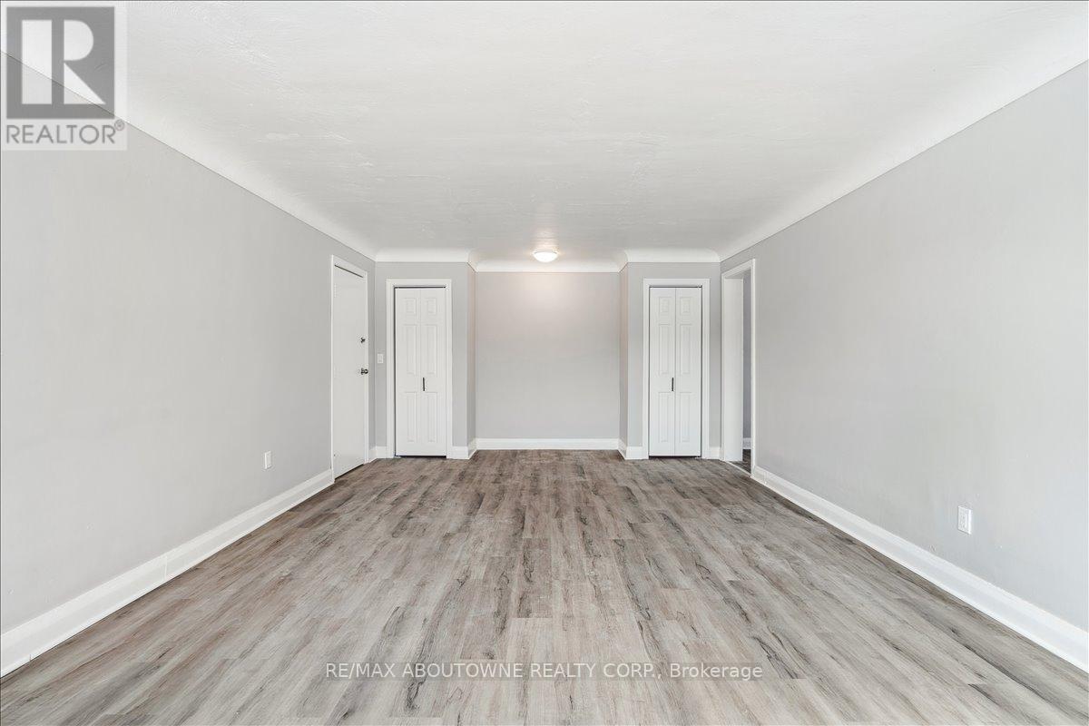 1 - 145 North Service Road E, Oakville, Ontario  L6H 1A3 - Photo 22 - W12445315