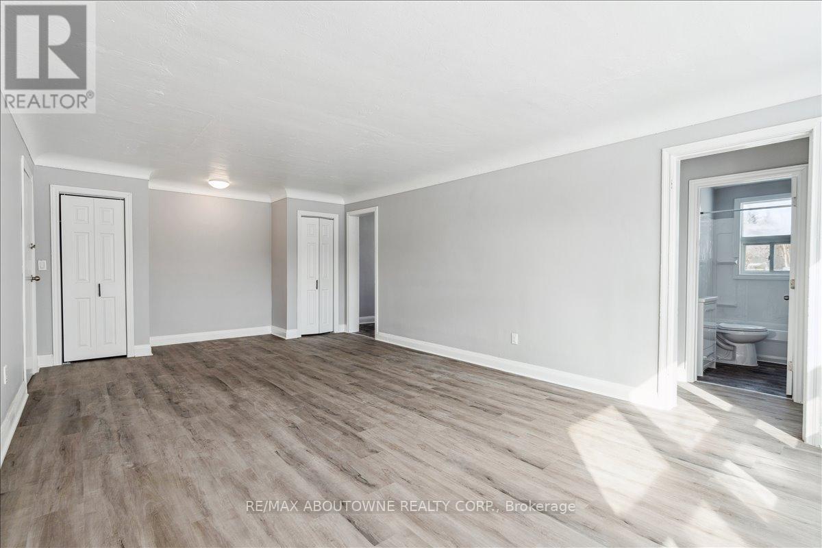 1 - 145 North Service Road E, Oakville, Ontario  L6H 1A3 - Photo 3 - W12445315