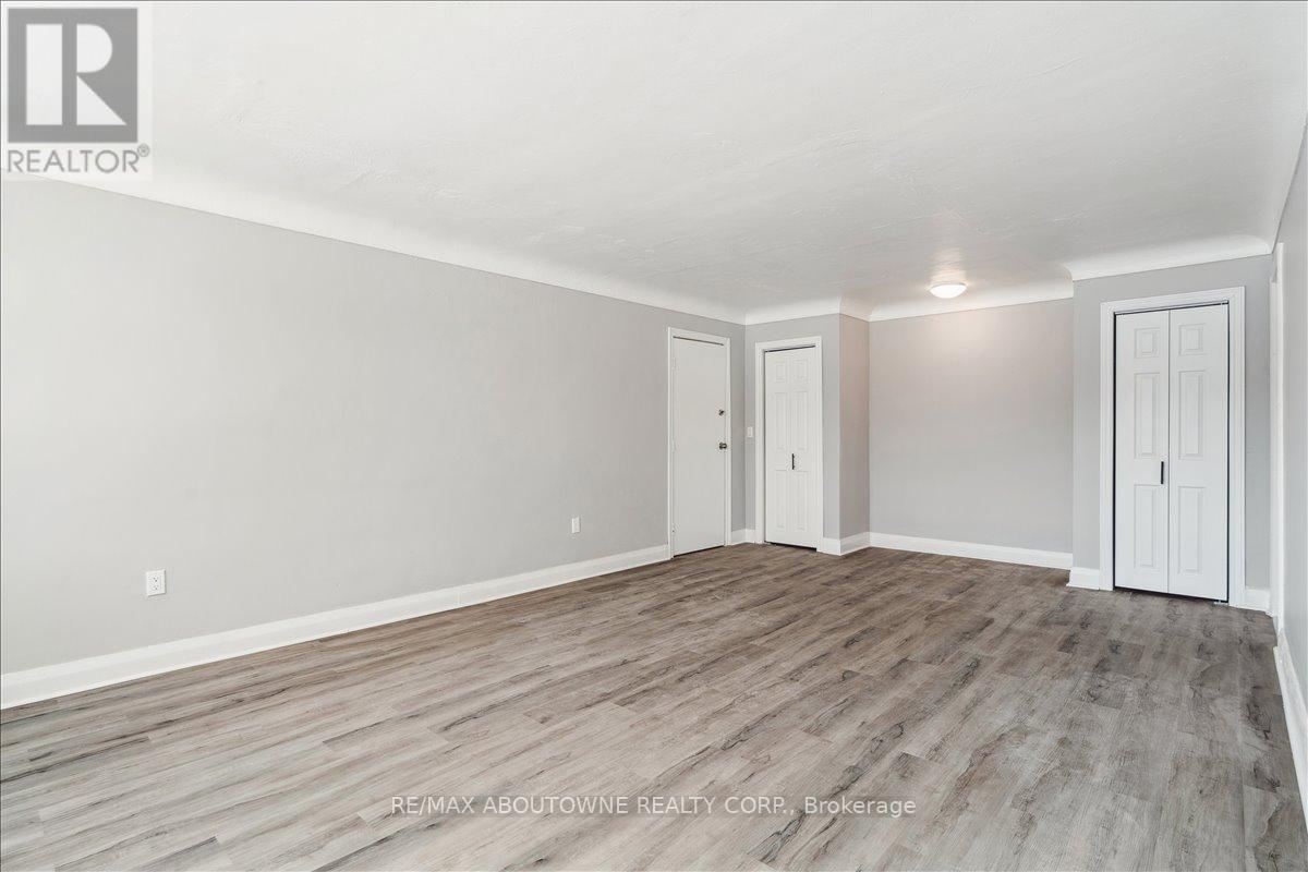 1 - 145 North Service Road E, Oakville, Ontario  L6H 1A3 - Photo 5 - W12445315