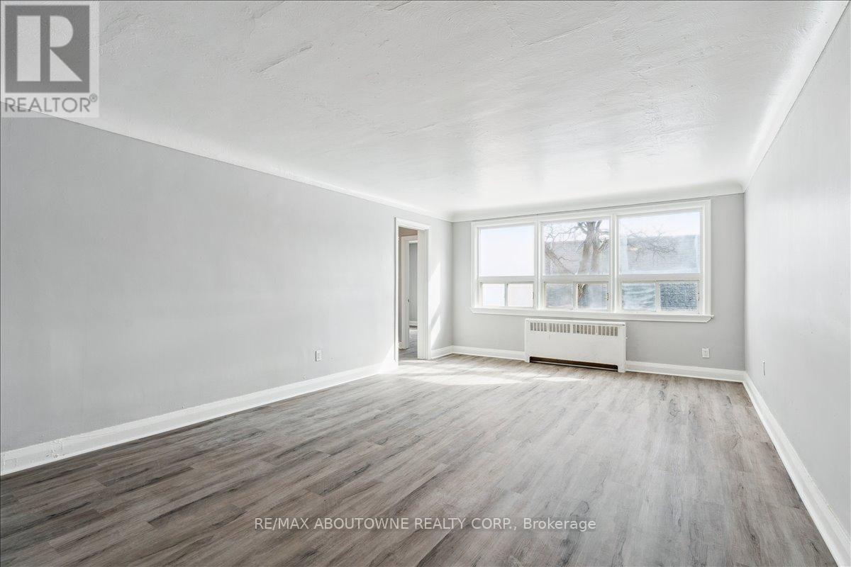 1 - 145 North Service Road E, Oakville, Ontario  L6H 1A3 - Photo 7 - W12445315