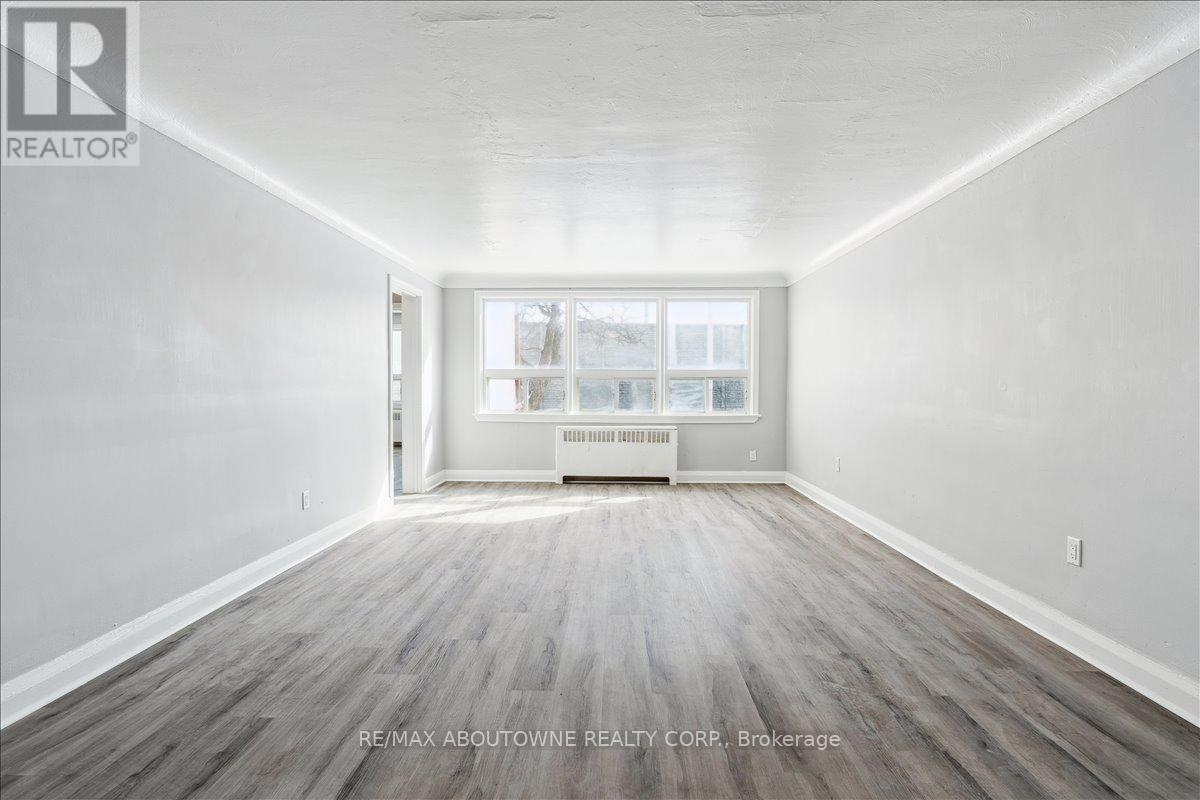 1 - 145 North Service Road E, Oakville, Ontario  L6H 1A3 - Photo 8 - W12445315