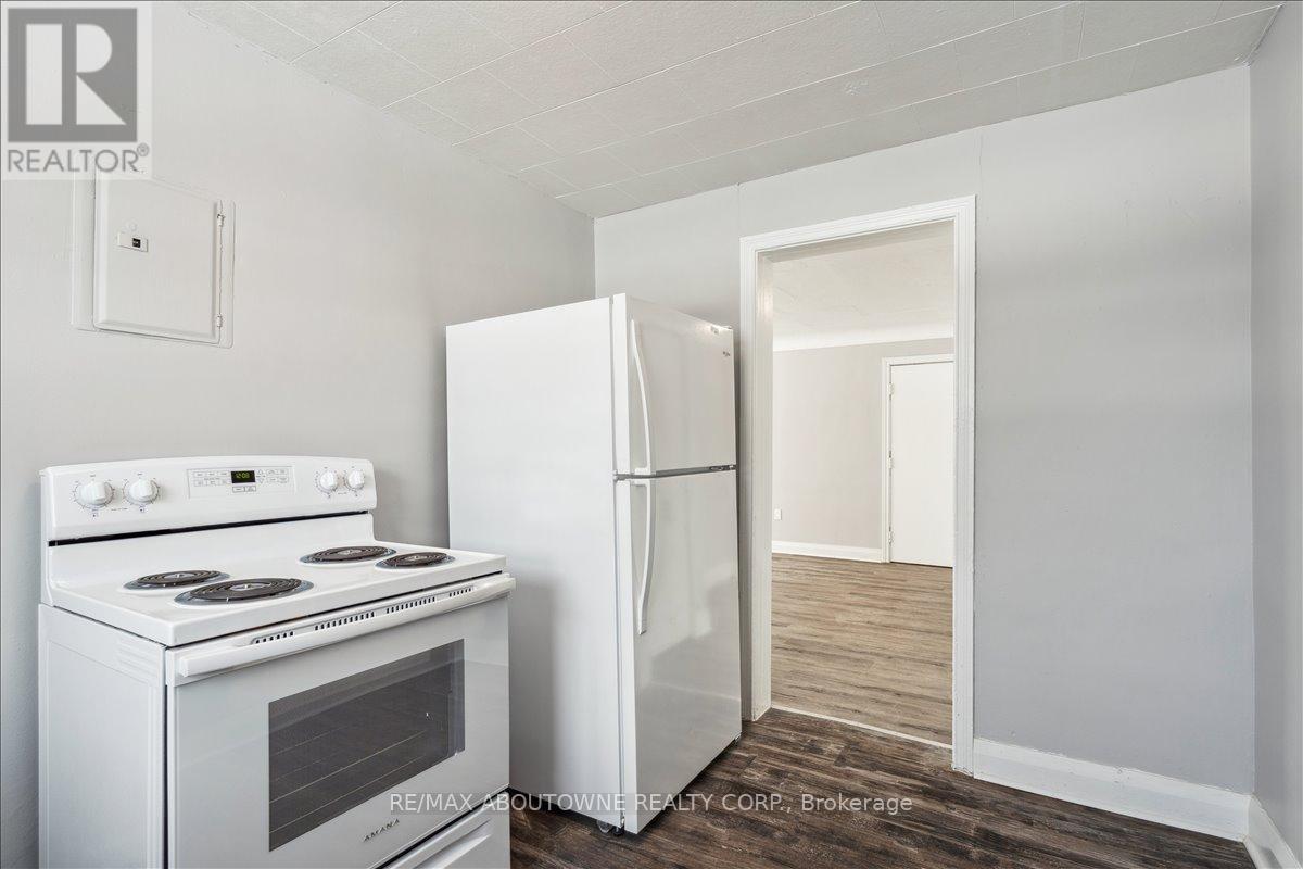 1 - 145 North Service Road E, Oakville, Ontario  L6H 1A3 - Photo 9 - W12445315
