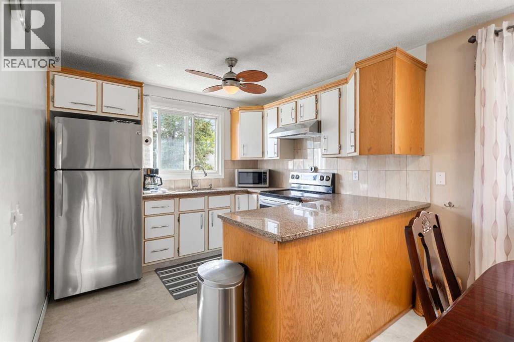 211 Abalone Place Ne, Calgary, Alberta  T2A 6S2 - Photo 6 - A2261773
