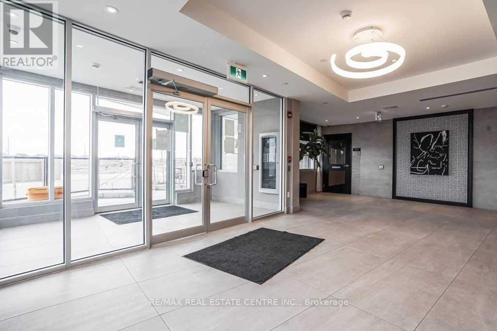 402 - 200 Lagerfeld Drive, Brampton, Ontario  L7A 5G5 - Photo 3 - W12445339