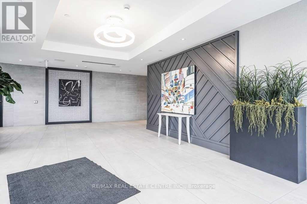402 - 200 Lagerfeld Drive, Brampton, Ontario  L7A 5G5 - Photo 4 - W12445339