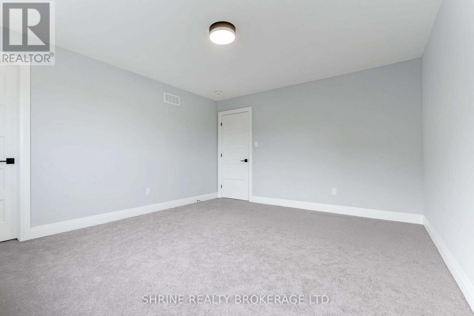 108 Watts Drive, Lucan Biddulph, Ontario  N0M 2J0 - Photo 24 - X12338422