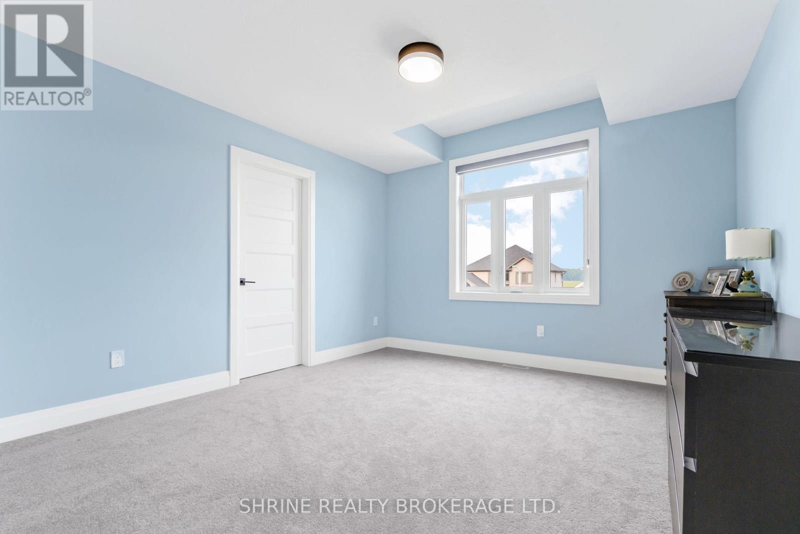 108 Watts Drive, Lucan Biddulph, Ontario  N0M 2J0 - Photo 25 - X12338422