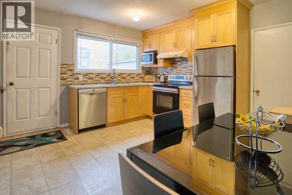 417 Goddard Avenue Ne, Calgary, Alberta  T2K 3T8 - Photo 8 - A2261922