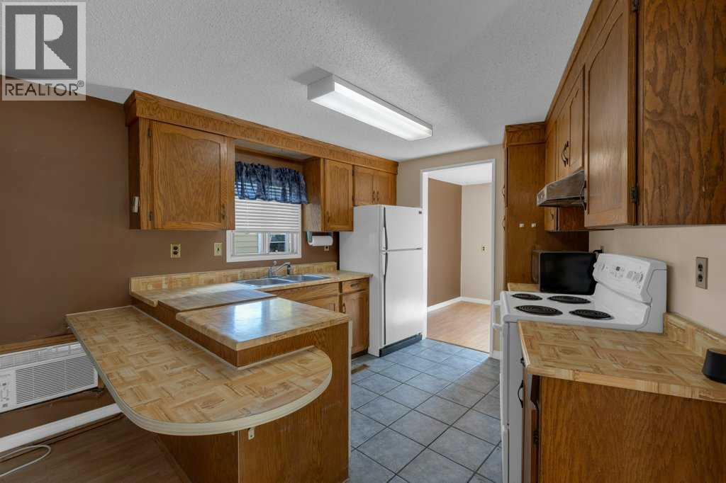 56 Spring Haven Close Se, Airdrie, Alberta  T4A 1G2 - Photo 9 - A2260009