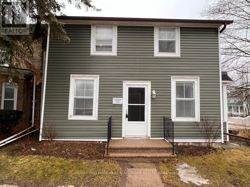 Front - 61 Wellington Street E, Aurora, Ontario  L4G 1H7 - Photo 1 - N12445535