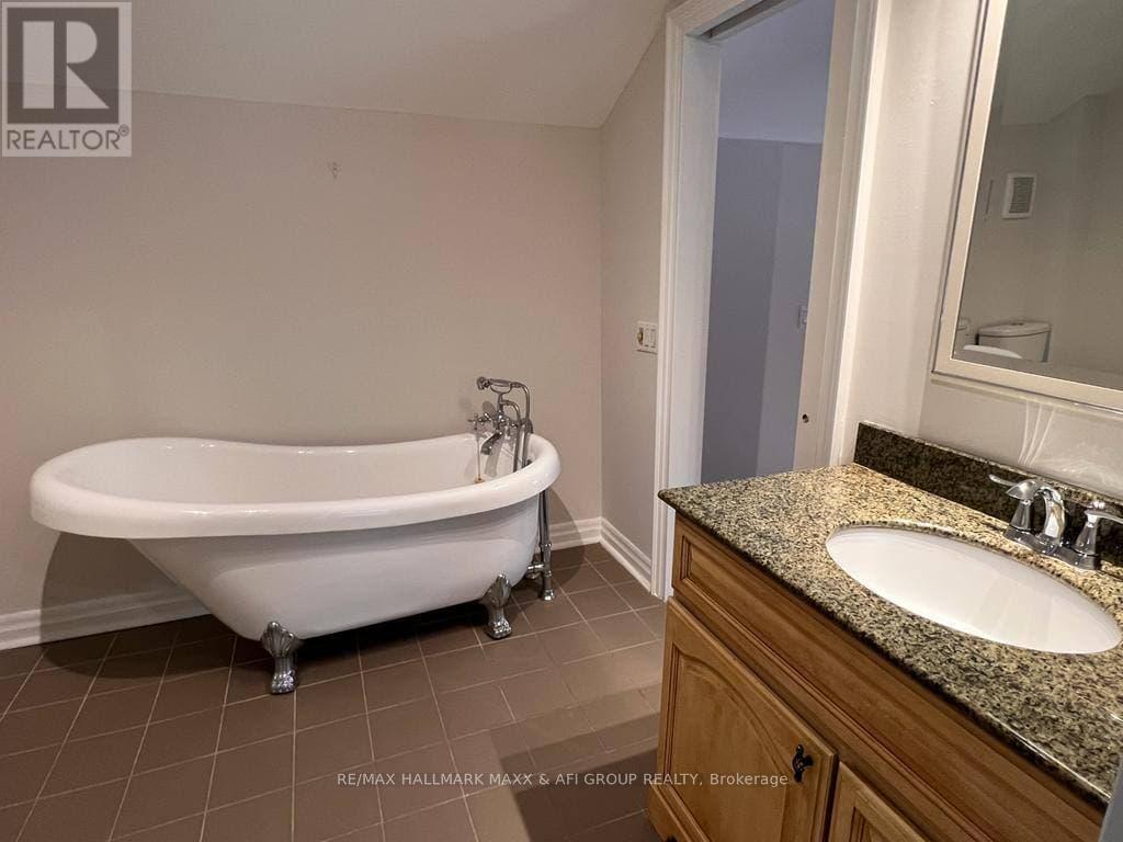 Front - 61 Wellington Street E, Aurora, Ontario  L4G 1H7 - Photo 15 - N12445535