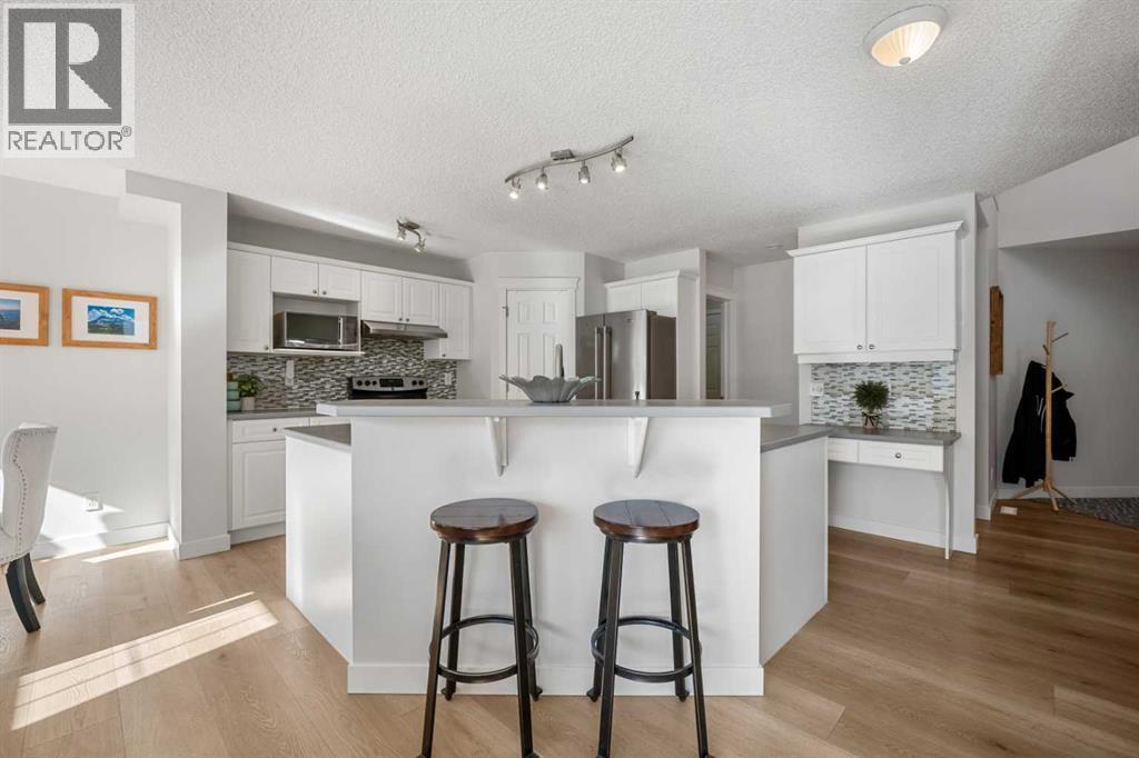 38 Harvest Park Circle Ne, Calgary, Alberta  T3K 4M8 - Photo 7 - A2261048