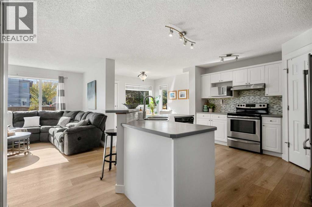 38 Harvest Park Circle Ne, Calgary, Alberta  T3K 4M8 - Photo 4 - A2261048