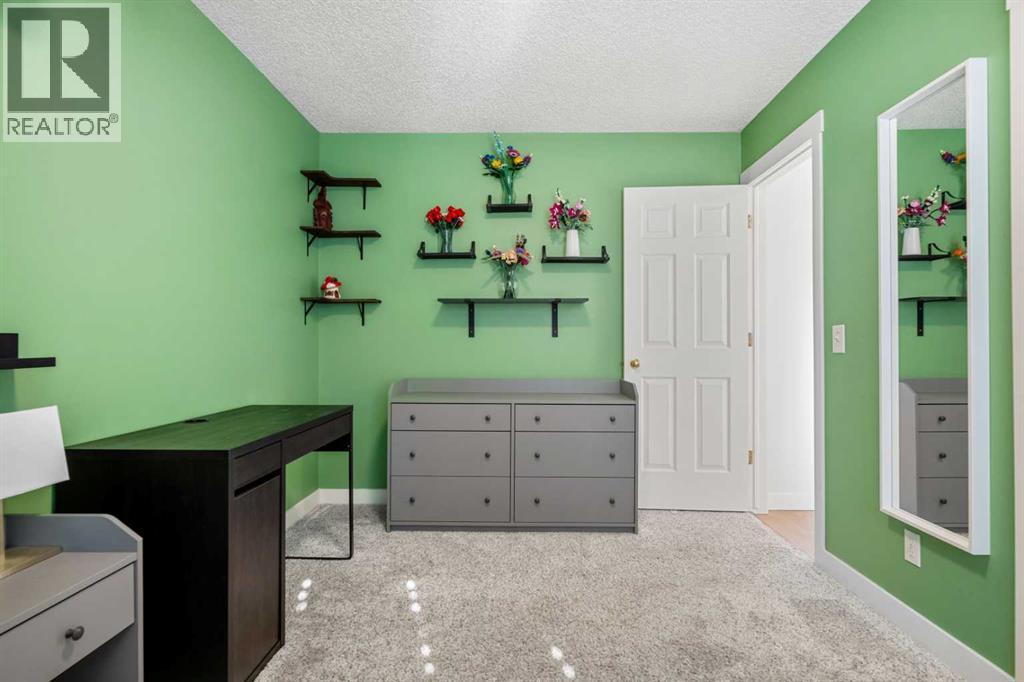 38 Harvest Park Circle Ne, Calgary, Alberta  T3K 4M8 - Photo 26 - A2261048