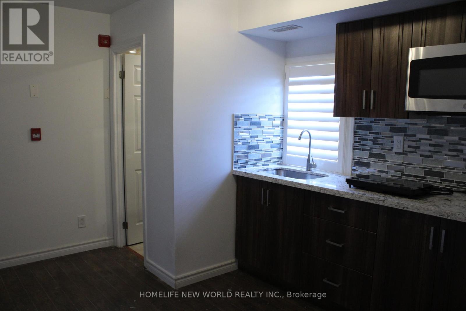 301 - 2466 St Clair Avenue W, Toronto, Ontario  M6N 1L3 - Photo 2 - W12445549