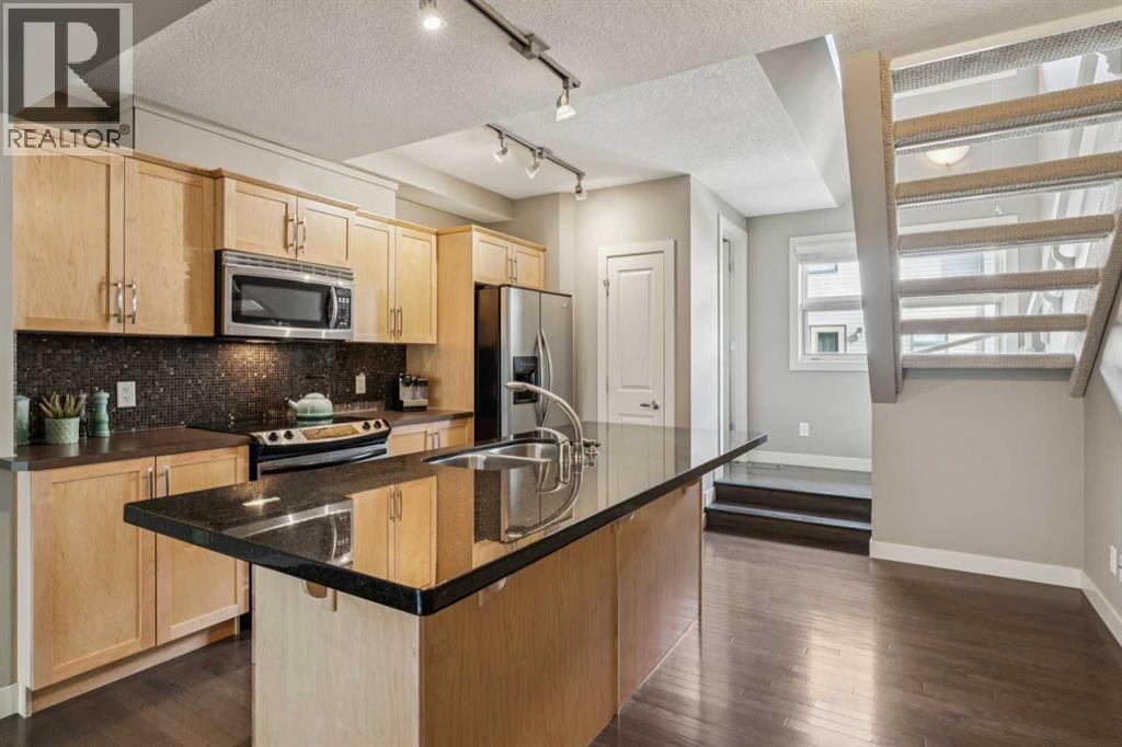 205 Aspen Hills Villas Sw, Calgary, Alberta  T3H 0H8 - Photo 5 - A2262197