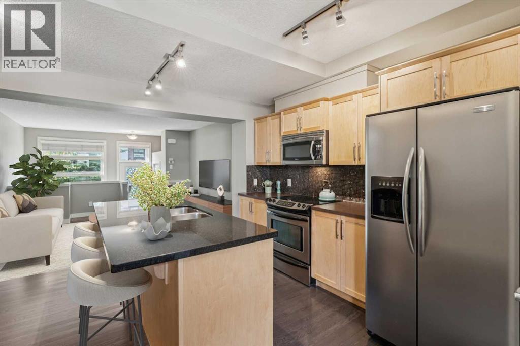205 Aspen Hills Villas Sw, Calgary, Alberta  T3H 0H8 - Photo 4 - A2262197