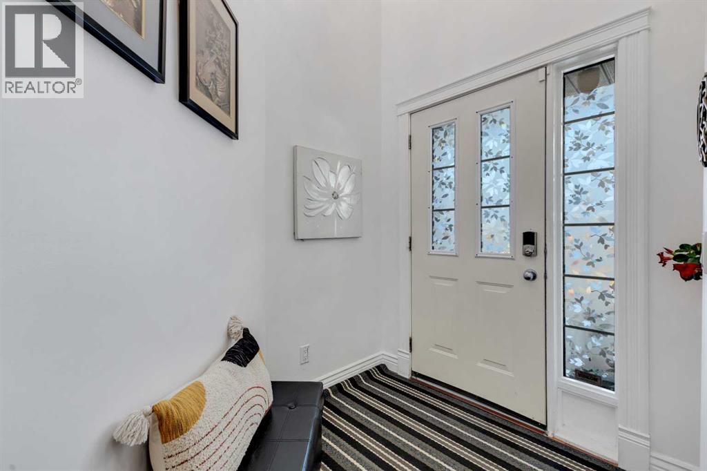 173 Panamount Green Nw, Calgary, Alberta  T3K 5R6 - Photo 4 - A2256720