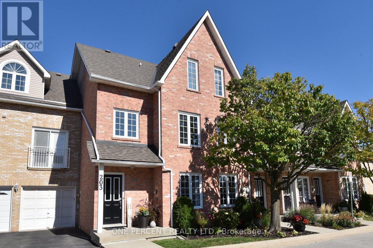 203 - 2075 Walkers Line, Burlington, Ontario  L7M 4G7 - Photo 2 - W12445645
