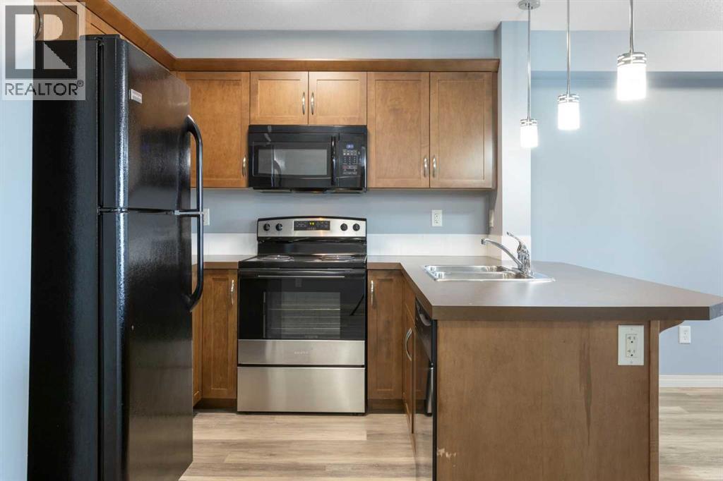 2316, 130 Panatella Street Nw, Calgary, Alberta  T3K 0Y6 - Photo 4 - A2257287