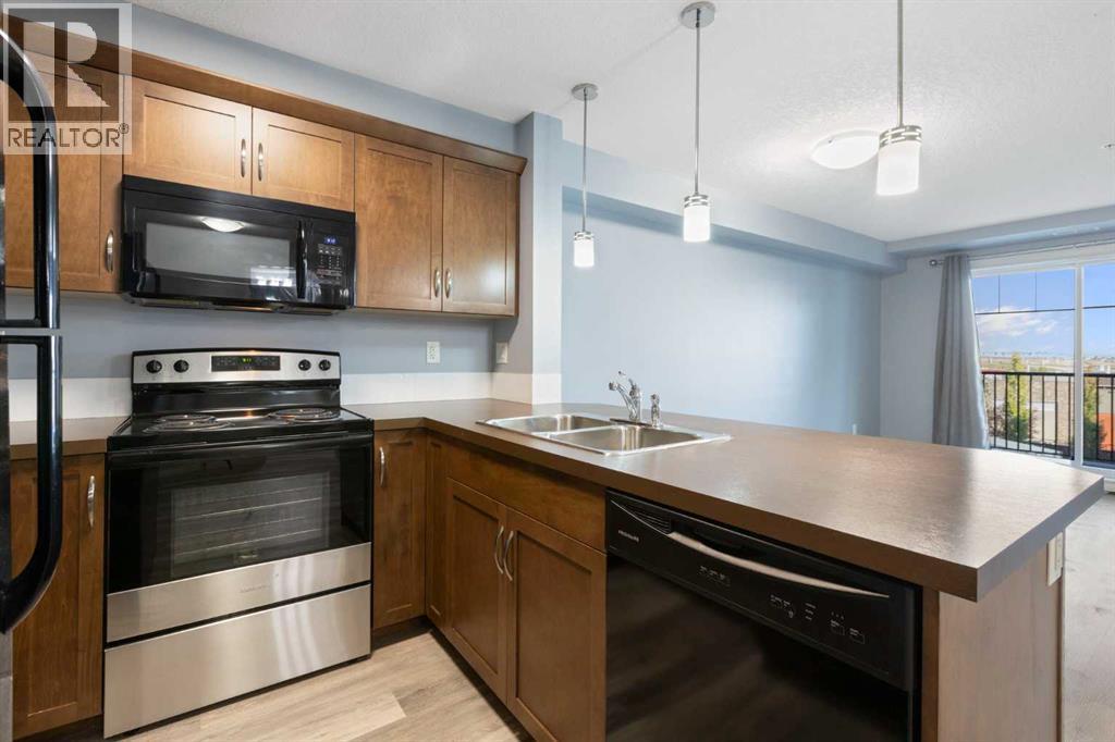 2316, 130 Panatella Street Nw, Calgary, Alberta  T3K 0Y6 - Photo 5 - A2257287