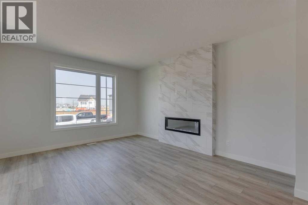 65 Southborough Lane, Cochrane, Alberta  T4C 2S6 - Photo 4 - A2251670