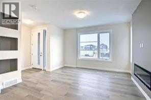 63 Lambeau Lane Se, Airdrie, Alberta  T4A 3P3 - Photo 4 - A2252055