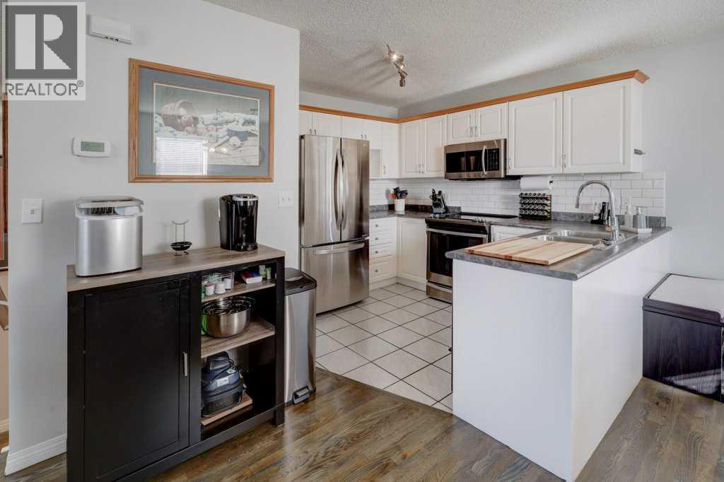 13 Ross Place, Crossfield, Alberta  T0M 0S0 - Photo 5 - A2262298