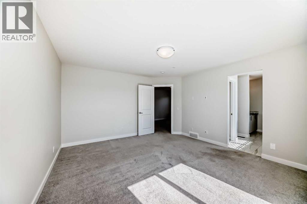 105 Creekside Way Sw, Calgary, Alberta  T2X 4A9 - Photo 25 - A2257749