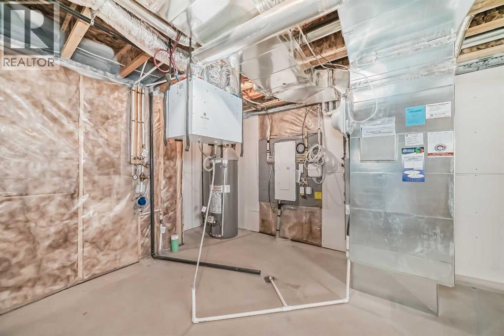 105 Creekside Way Sw, Calgary, Alberta  T2X 4A9 - Photo 48 - A2257749