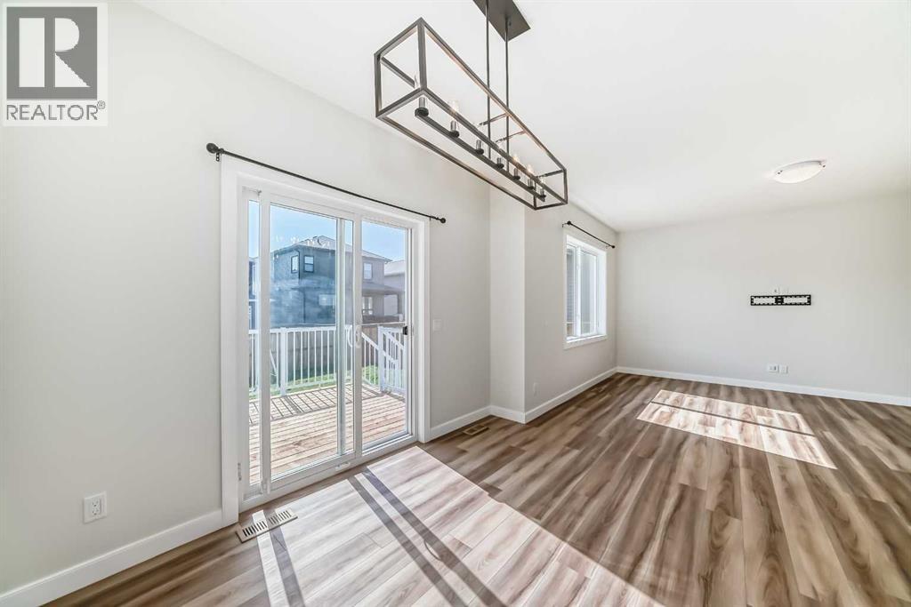 105 Creekside Way Sw, Calgary, Alberta  T2X 4A9 - Photo 7 - A2257749