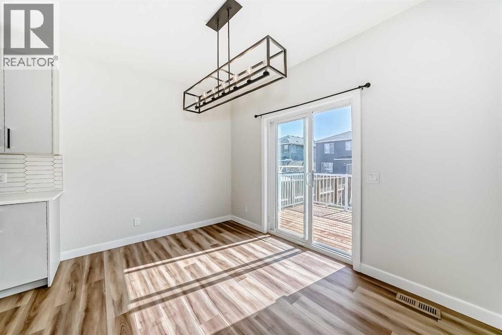 105 Creekside Way Sw, Calgary, Alberta  T2X 4A9 - Photo 6 - A2257749