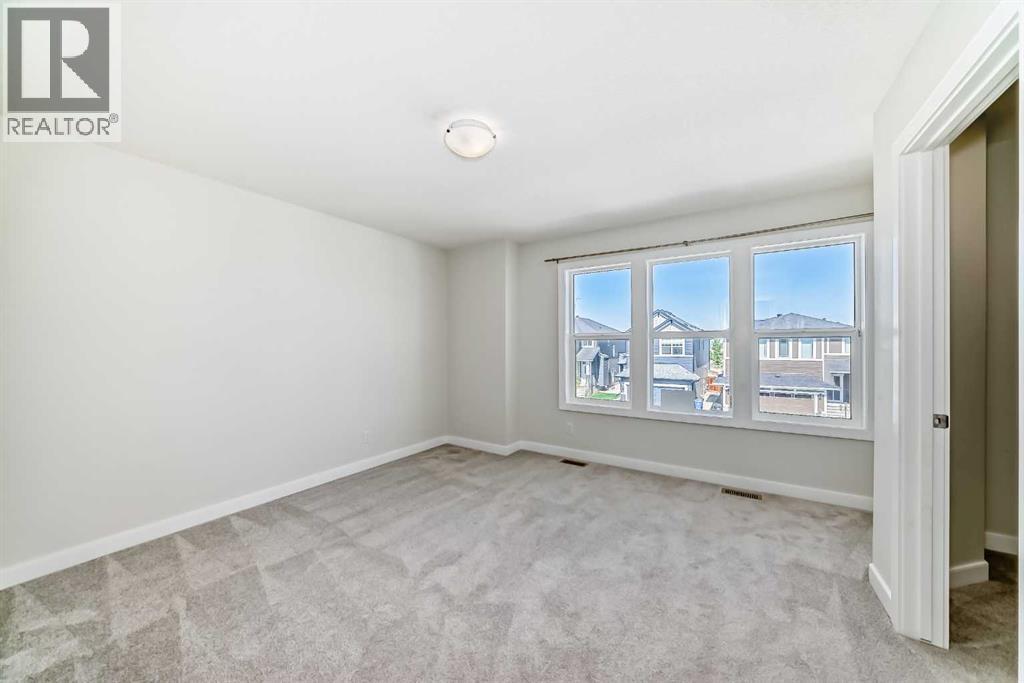 105 Creekside Way Sw, Calgary, Alberta  T2X 4A9 - Photo 31 - A2257749