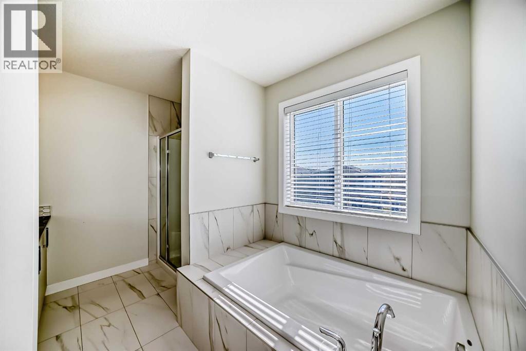 105 Creekside Way Sw, Calgary, Alberta  T2X 4A9 - Photo 27 - A2257749