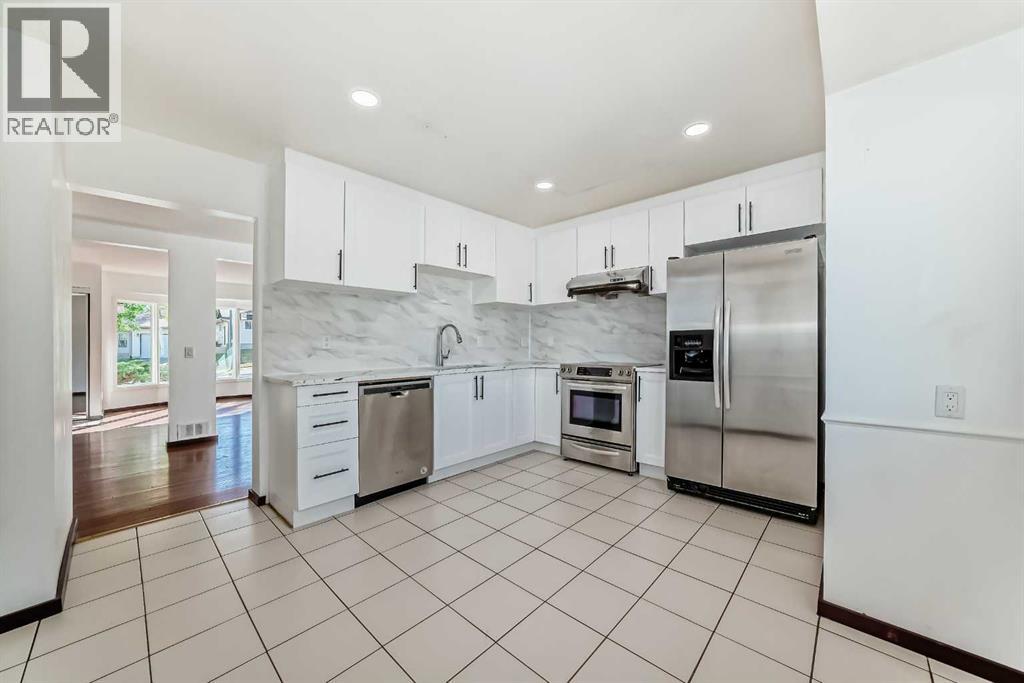 79 Bermuda Drive Nw, Calgary, Alberta  T3K 1H5 - Photo 8 - A2257528