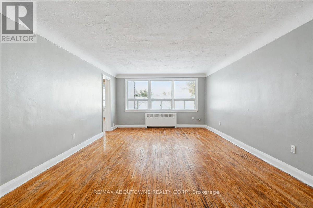 2 - 145 North Service Road E, Oakville, Ontario  L6H 1A3 - Photo 4 - W12445301