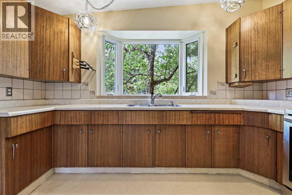 10623 Bradbury Drive Sw, Calgary, Alberta  T2W 1A9 - Photo 19 - A2259287