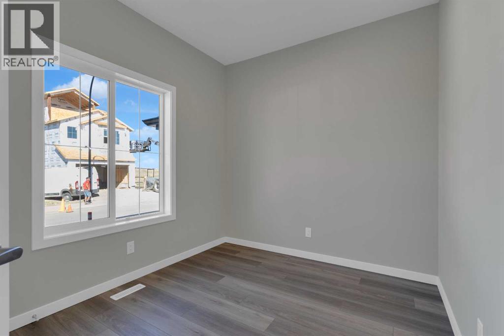 69 Silver Spruce Road Sw, Calgary, Alberta  T2X 6A7 - Photo 4 - A2259722