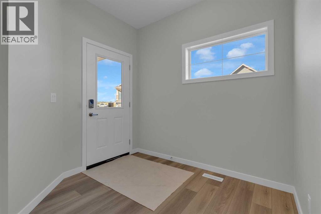 69 Silver Spruce Road Sw, Calgary, Alberta  T2X 6A7 - Photo 2 - A2259722