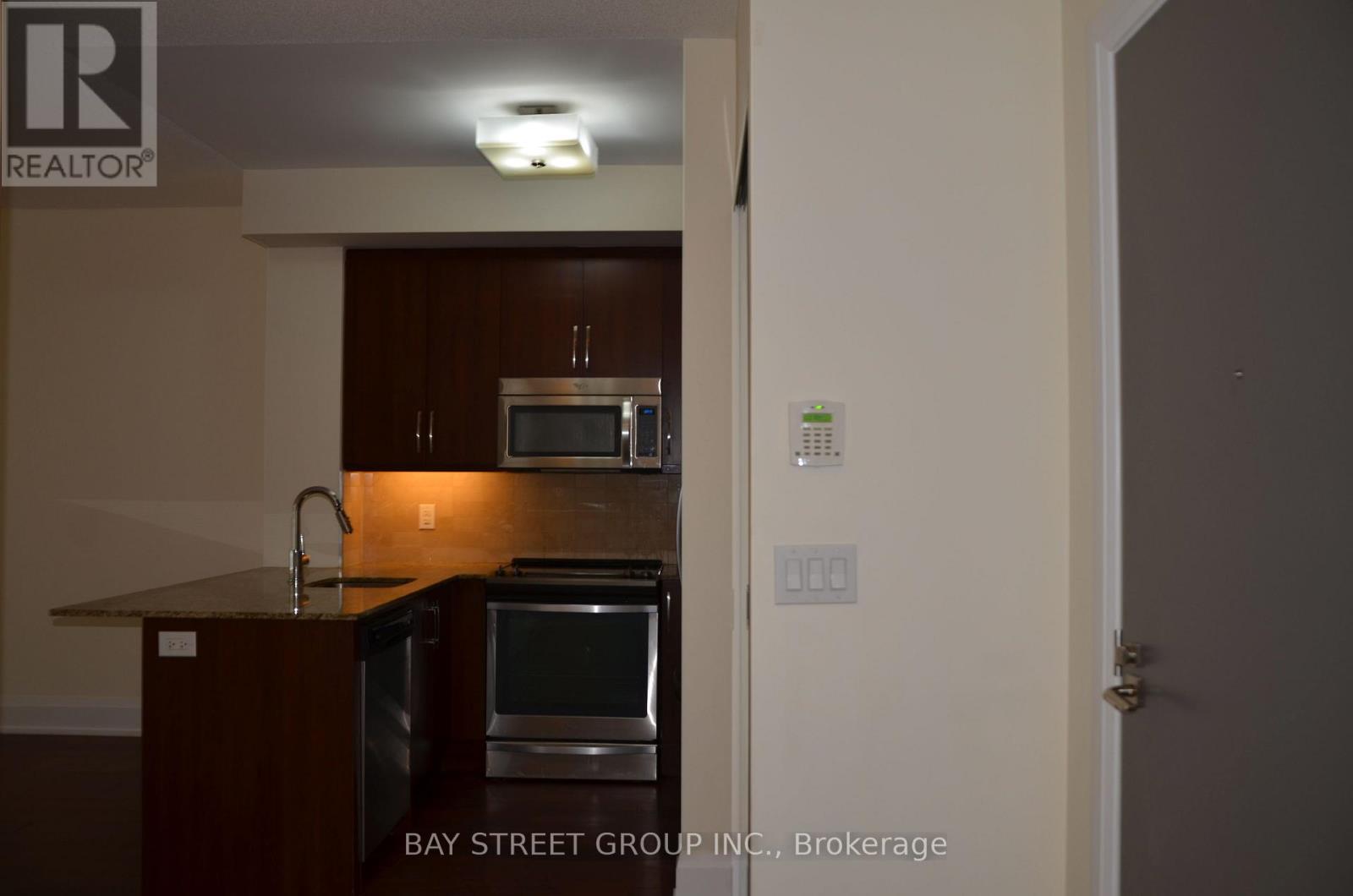 124 - 1 Old Mill Drive, Toronto, Ontario  M6S 0A1 - Photo 5 - W12445871