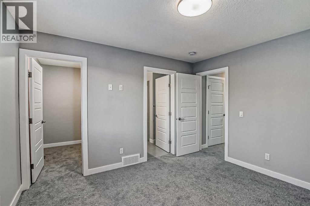 23 Agate Road, Cochrane, Alberta  T4C 3B9 - Photo 27 - A2201917