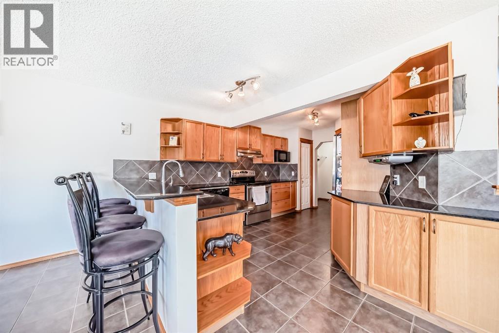 398 Chaparral Ridge Circle Se, Calgary, Alberta  T2X 3Y1 - Photo 4 - A2257329