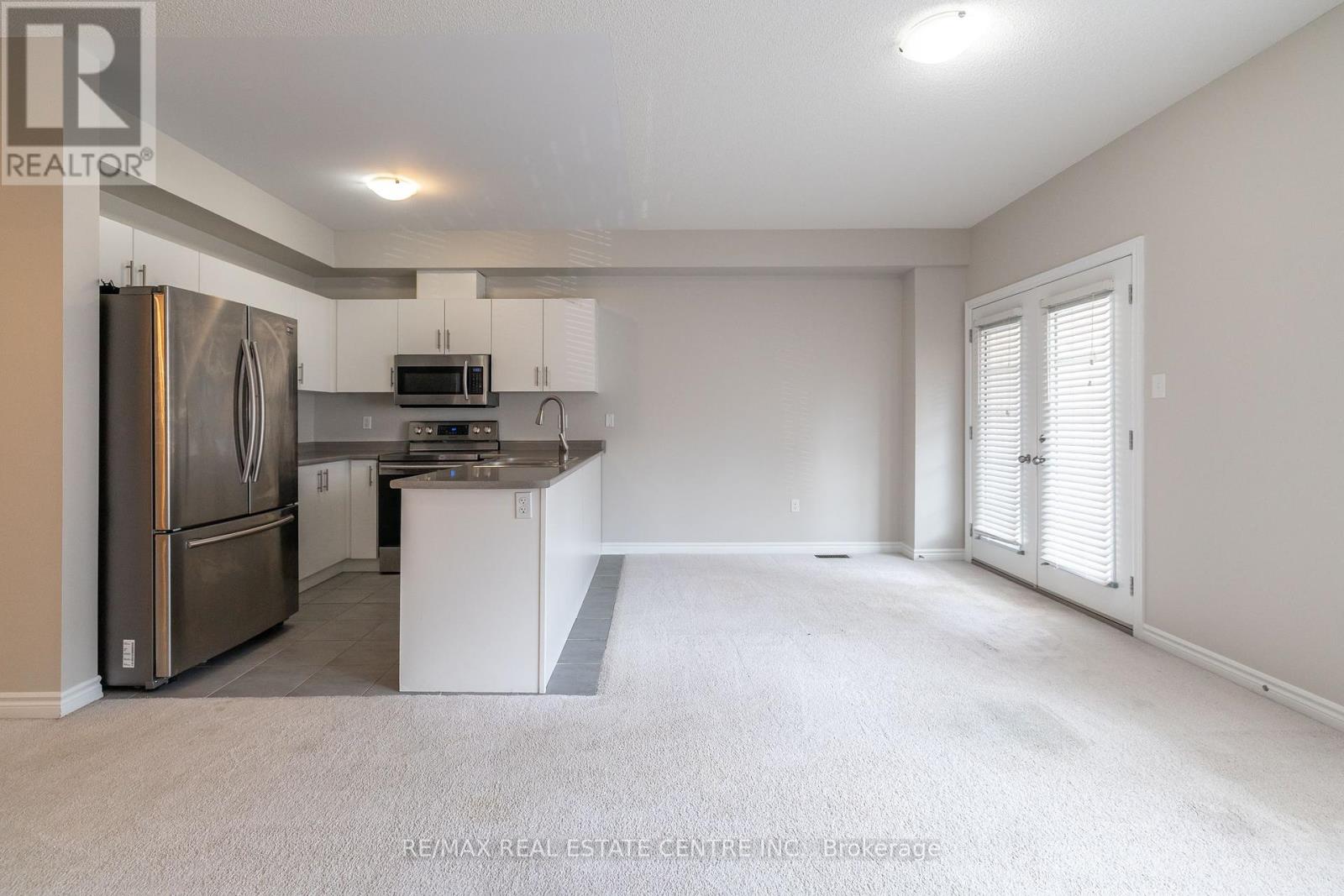 80 - 88 Decorso Drive, Guelph, Ontario  N1L 0A1 - Photo 5 - X12445916
