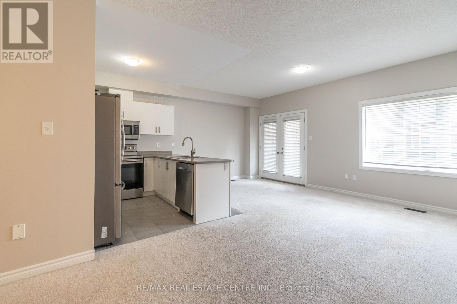 80 - 88 Decorso Drive, Guelph, Ontario  N1L 0A1 - Photo 7 - X12445916