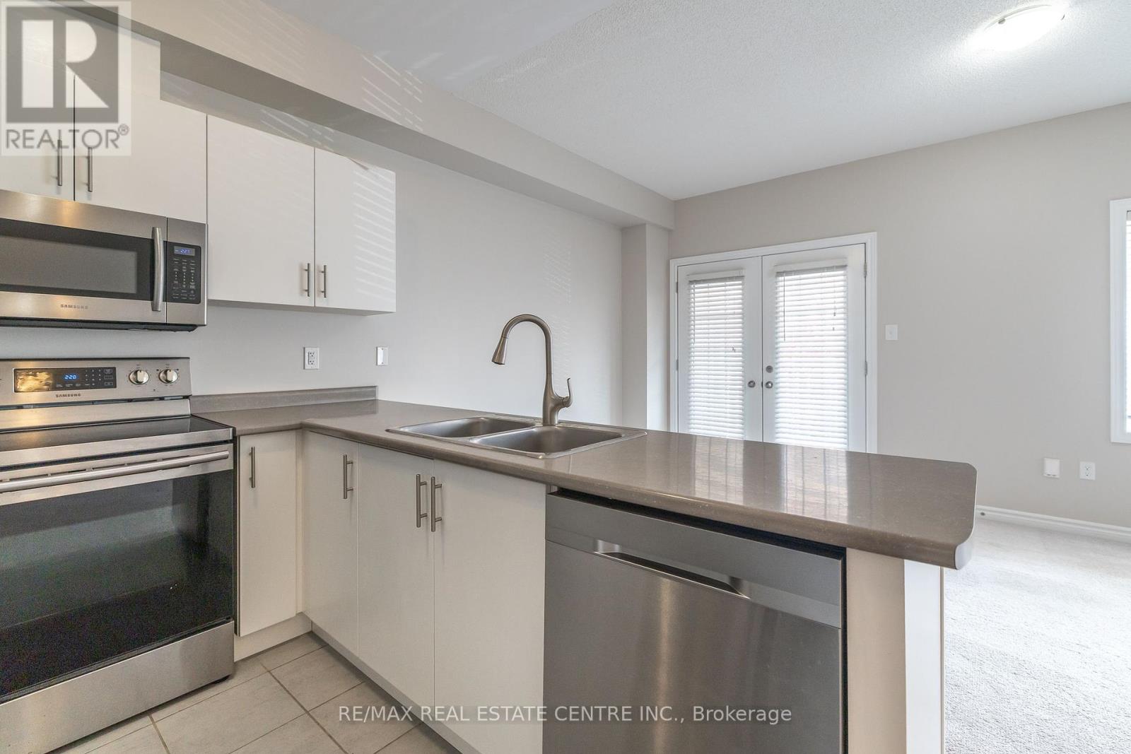 80 - 88 Decorso Drive, Guelph, Ontario  N1L 0A1 - Photo 9 - X12445916