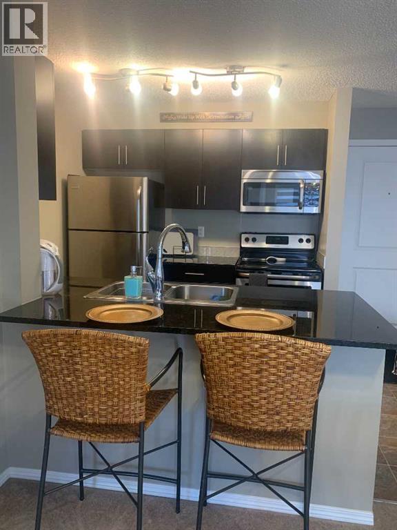 3416, 81 Legacy Boulevard Se, Calgary, Alberta  T2X 2B9 - Photo 5 - A2246643