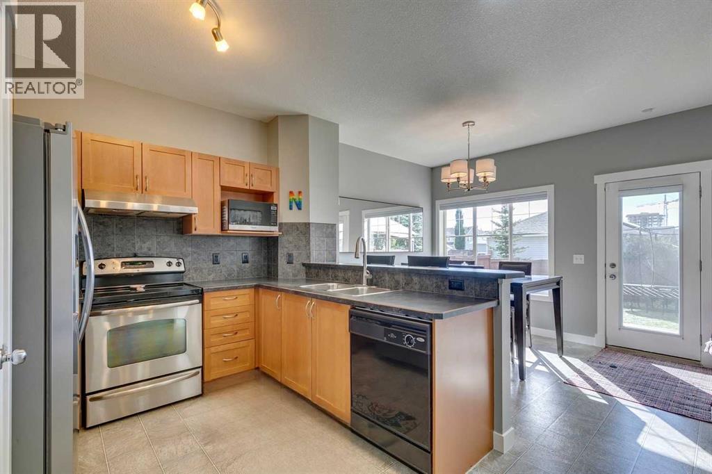 320 Cougartown Circle Sw, Calgary, Alberta  T3H 0A5 - Photo 5 - A2261989