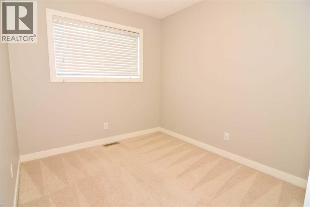 156 Pantego Lane Nw, Calgary, Alberta  T3K 0T1 - Photo 15 - A2260230